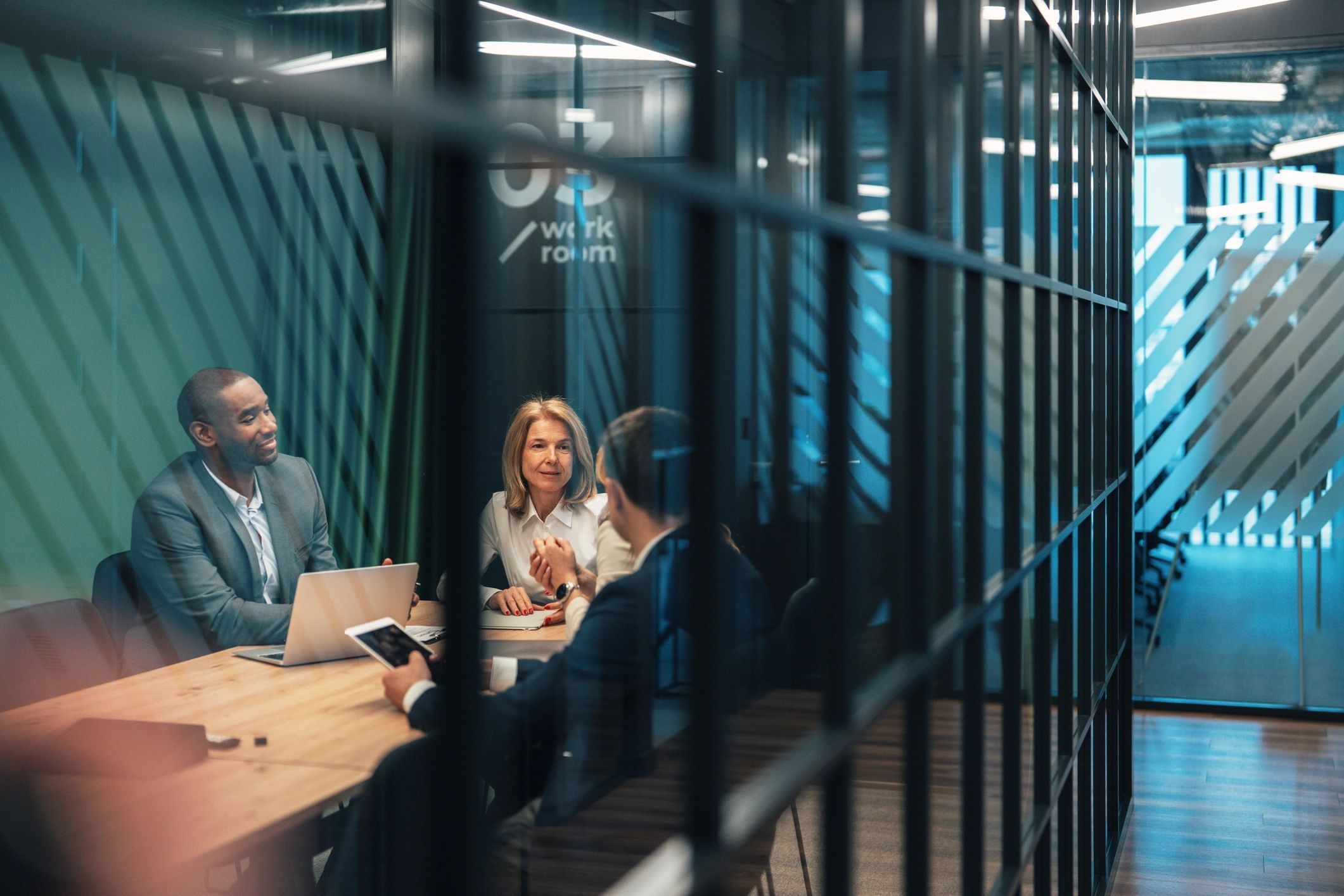 Business consultants reviewing strategy in contemporary office setting